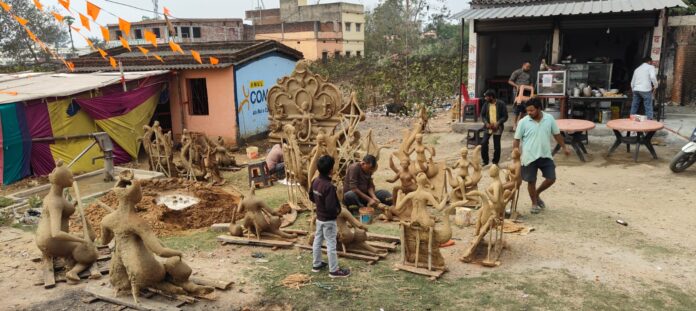 Preparations for Saraswati Puja begin, artisans busy making idols.